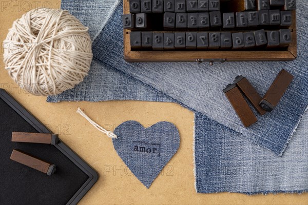 Flat lay arrangement with jeans fabric