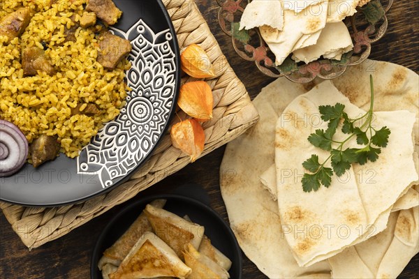 Flat lay meal with rice pita