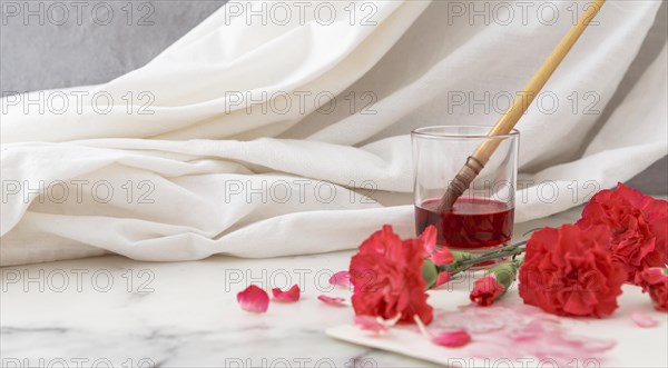 Flowers with glass beside 2