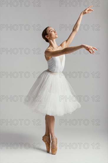 Full shot beautiful woman performing ballet