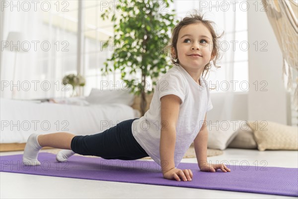 Full shot girl training yoga mat