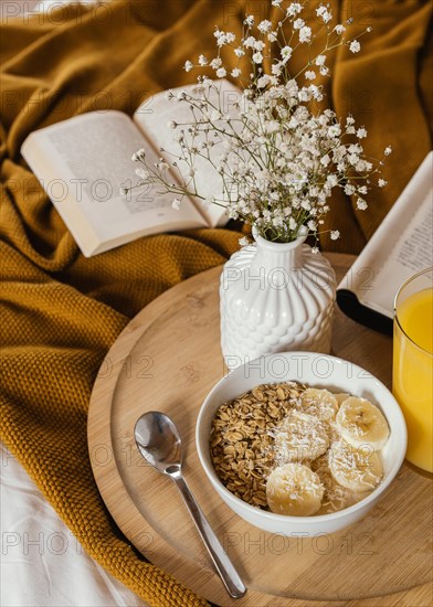 High angle bowl with cereal banana slices