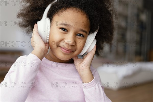 Little girl with headphones 3
