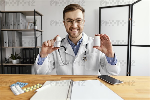 Medium shot doctor holding medicine 2