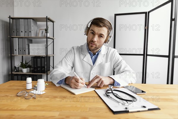 Medium shot doctor with headphones 2