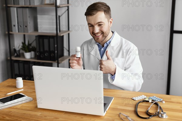 Medium shot doctor with thumb up