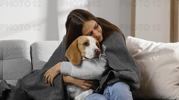Medium shot girl hugging dog