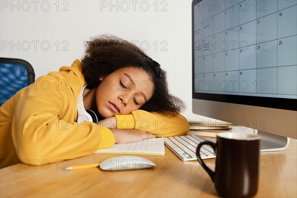 Medium shot girl sleeping desk