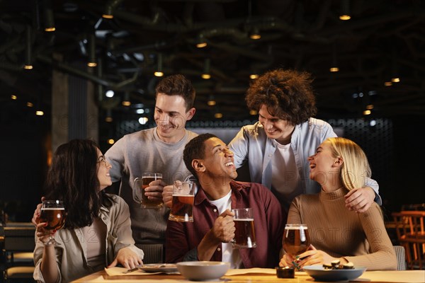 Medium shot happy friends sitting pub