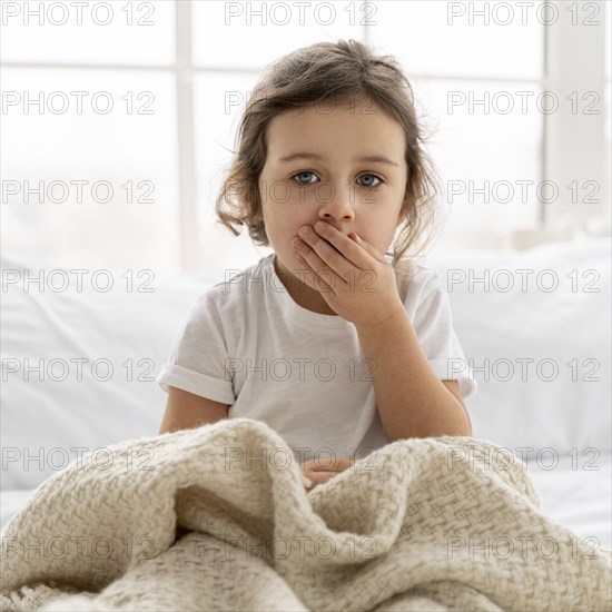 Medium shot kid with blanket