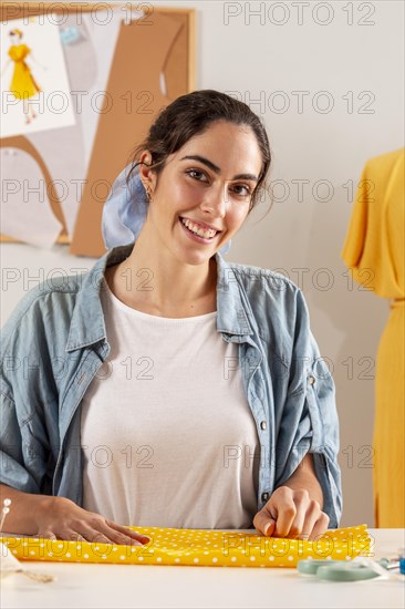 Medium shot smiley woman posing 2