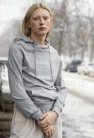 Medium shot woman posing outdoors 2