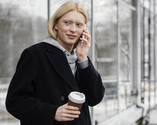 Medium shot woman with phone