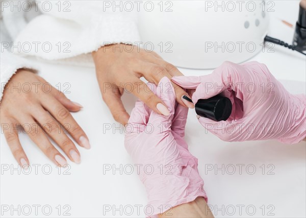 Nail hygiene care person wearing gloves