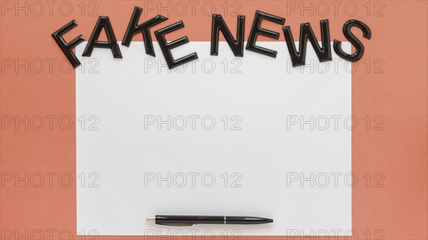 Paper sheet with fake news