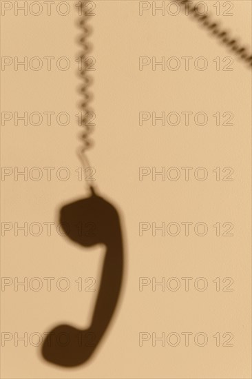 Shadow telephone wall