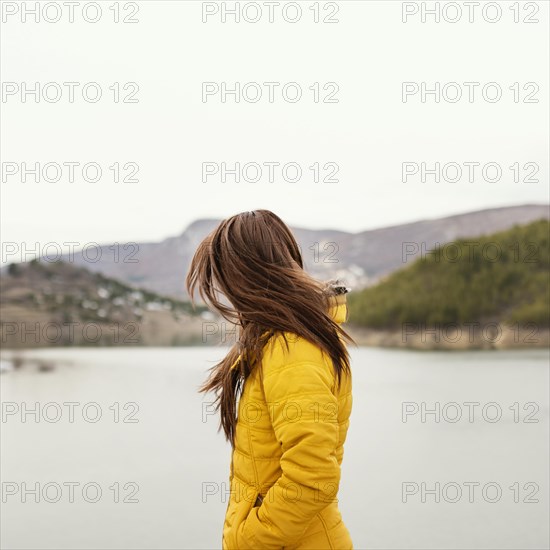 Side view young beautiful woman nature