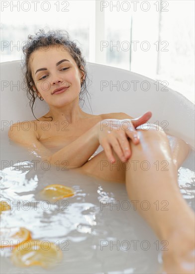 Woman bathtub taking bath 2