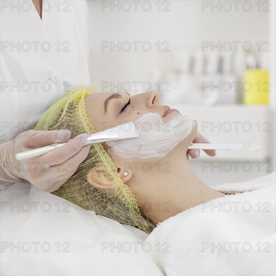 Woman beauty clinic face treatment 11