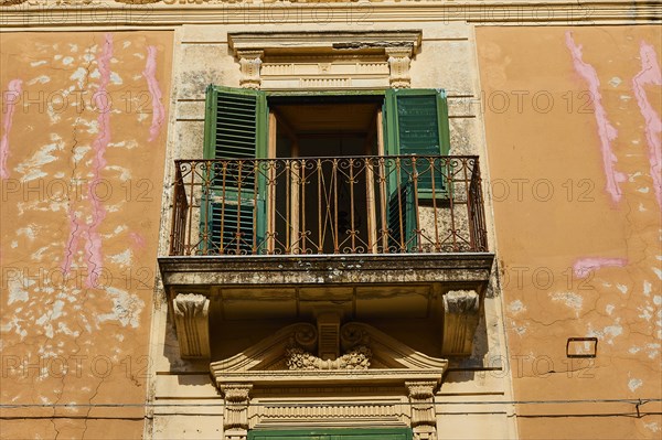 Ochre-coloured house wall