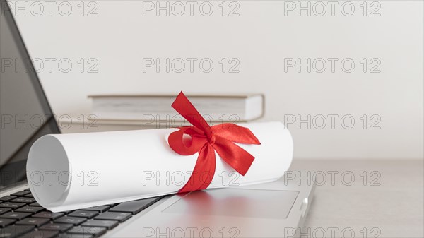 Certificate with ribbon bow