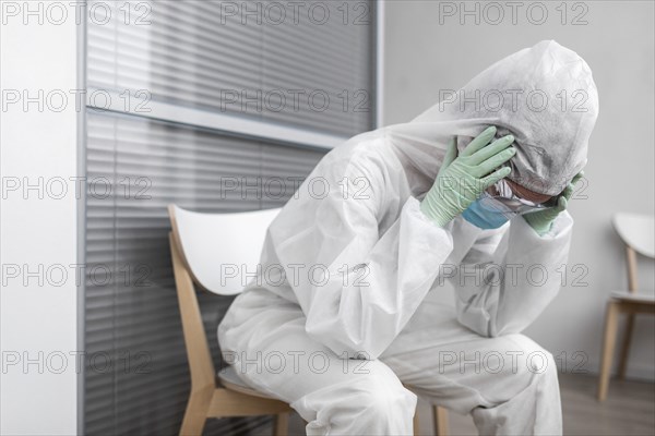 Person protective suit having headache