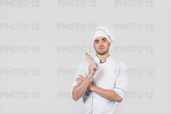 Portrait chef with rolling pin
