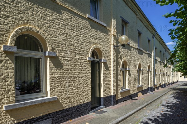 Yellow workers' townhouses