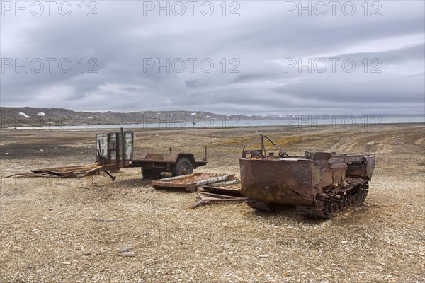 Rusty amphibian vehicle at deserted 1950s Kinnvika Arctic research station