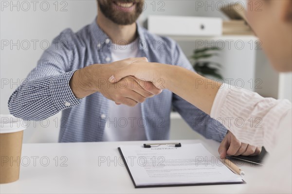Close up business meeting handshake