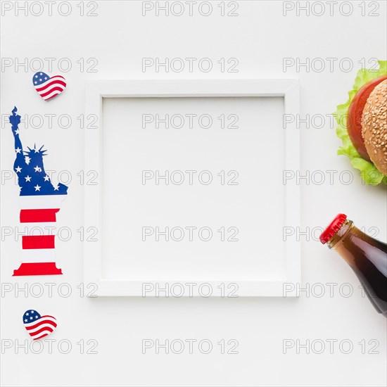 Top view frame with burger soda bottle statue liberty