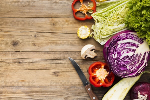 Vegetables assortment wooden background with copy space