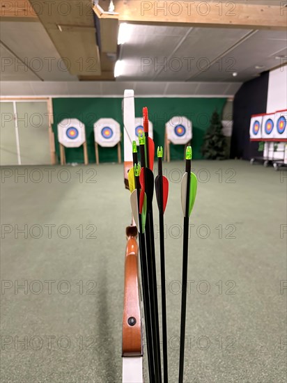 Modern Shooting Range For Archery with Arch and Arrow in an Illuminated Underground Tunnel in Switzerland