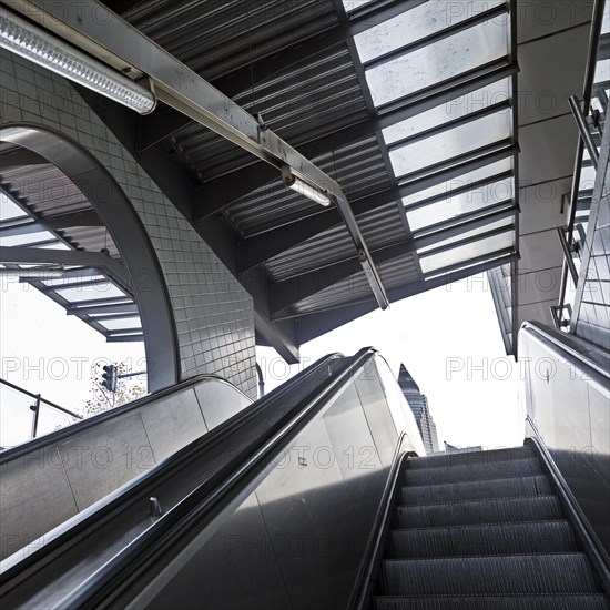 Escalator underground station Bockenheimer Warte with the top of the Messeturm