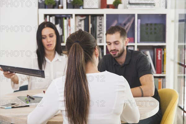 Woman sitting office talking