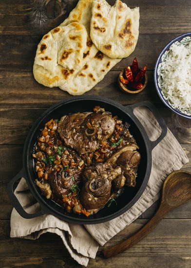 Tasty pakistani dish flat lay