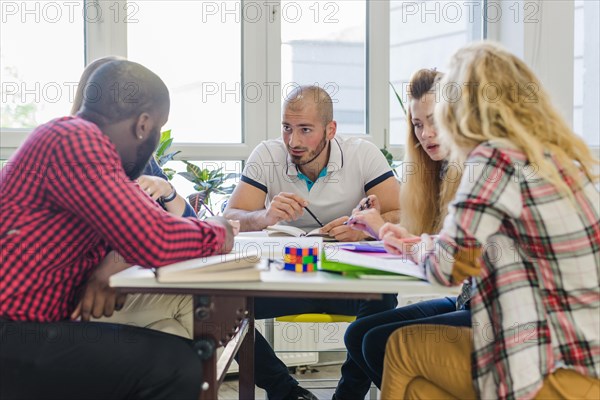 Young students working project together