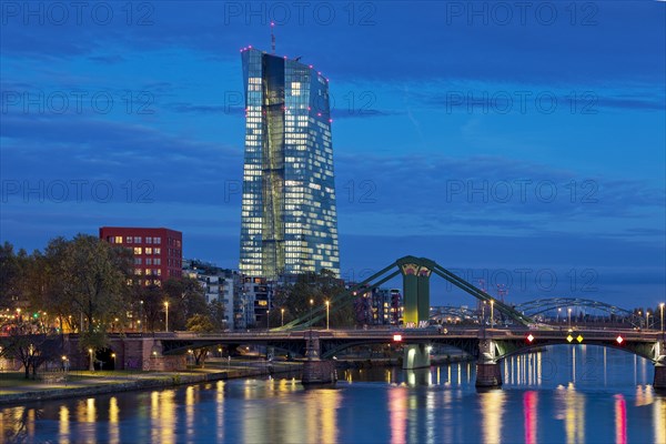 City view in the evening with the river Main and the European Central Bank