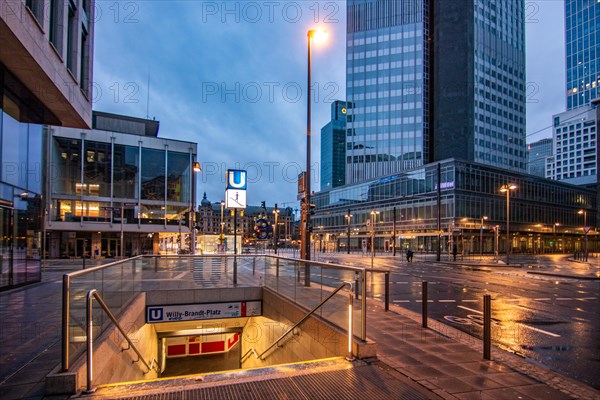 Sunset between skyscrapers. Cityscape with modern office buildings and streets. Insurance companies and banks as a cityscape in Frankfurt am Main