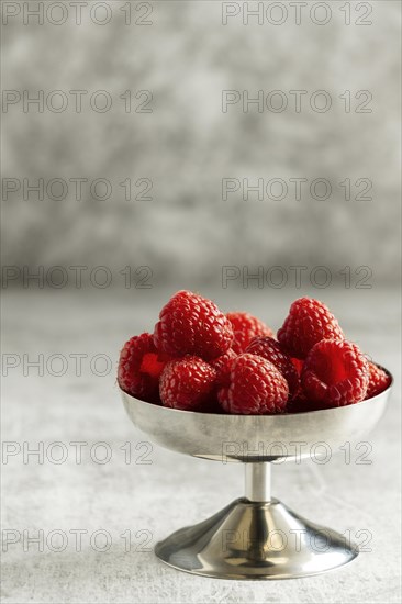 Delicious raspberries bowl arrangement