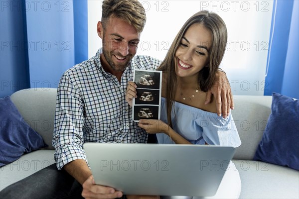 Young couple having videoconference