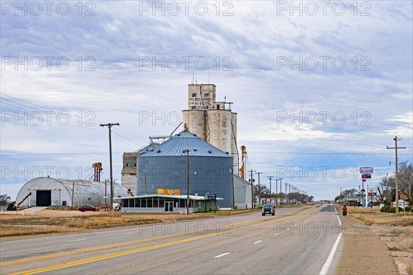 Silos connected to a grain elevator on a farm in the village Melrose in Curry County