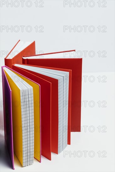 Notebooks with colorful covers arrangement
