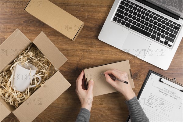 Woman preparing cyber monday box