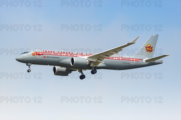 An Air Canada Airbus A220-300 aircraft with the registration C-GNBN in the Trans-Canada Air Lines retro special livery at Dallas Fort Worth Airport