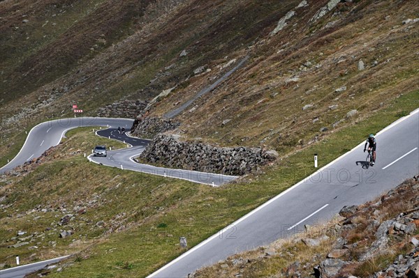 Racing cyclists on the Timmelsjoch High Alpine Road between Austria and Italy