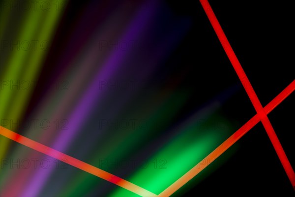 Red neon lines colorful laser light dark background