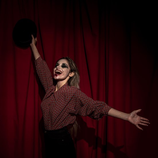 Side view woman dressed as clown being happy