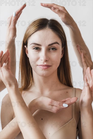 Young redhead smiling woman frame hands