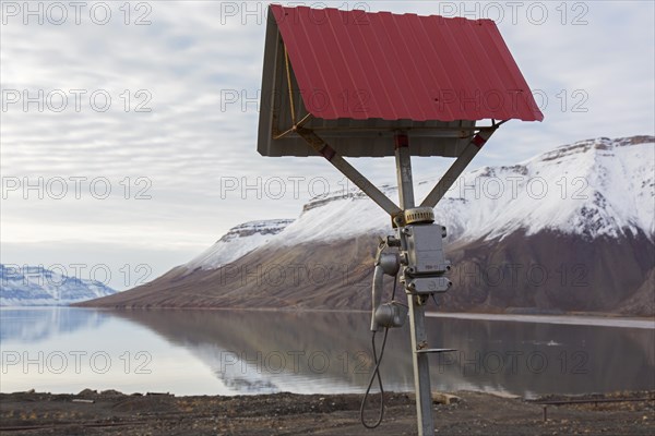 Old outdoor telephone at Pyramiden